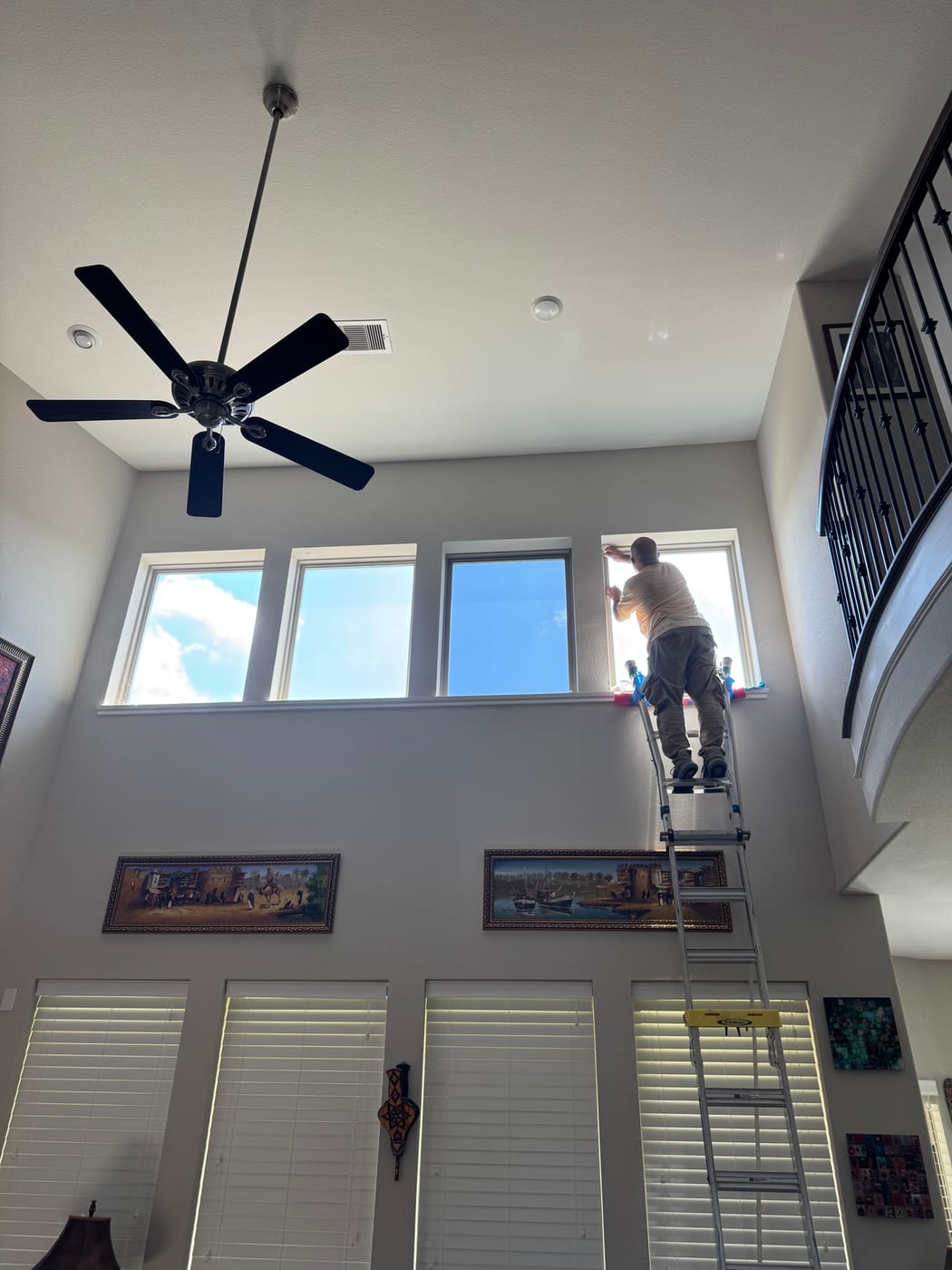 Katy, TX: Installing film on the upper windows